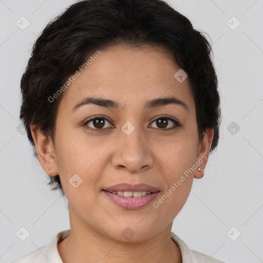 Joyful latino young-adult female with short  brown hair and brown eyes