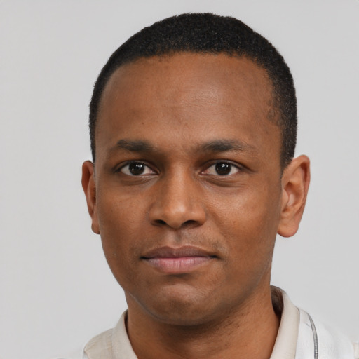 Neutral black young-adult male with short  black hair and brown eyes