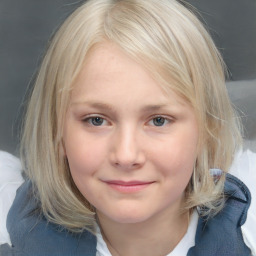 Joyful white child female with medium  brown hair and grey eyes