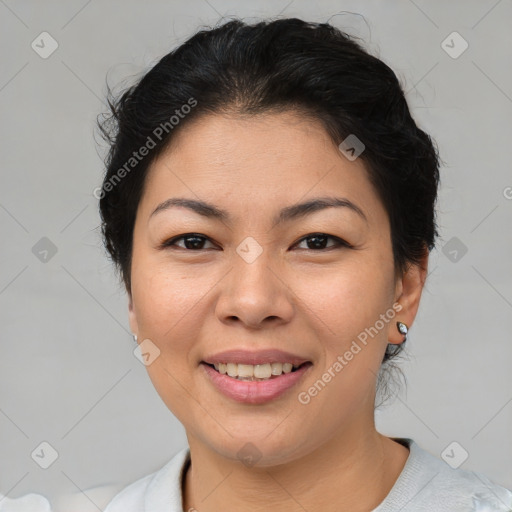 Joyful asian young-adult female with short  brown hair and brown eyes