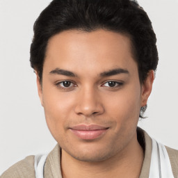 Joyful latino young-adult male with short  brown hair and brown eyes