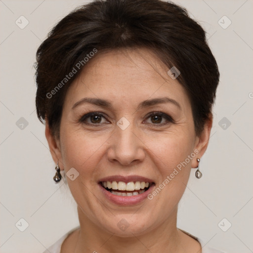 Joyful white adult female with short  brown hair and brown eyes