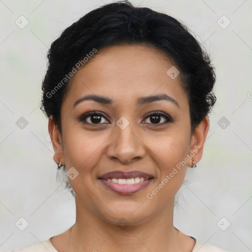 Joyful latino young-adult female with short  brown hair and brown eyes