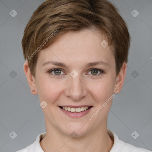 Joyful white young-adult female with short  brown hair and grey eyes