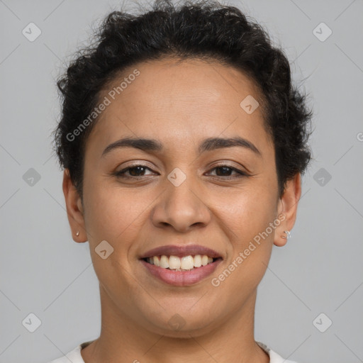 Joyful latino young-adult female with short  brown hair and brown eyes