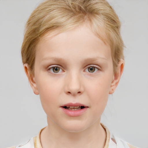 Joyful white child female with short  brown hair and blue eyes