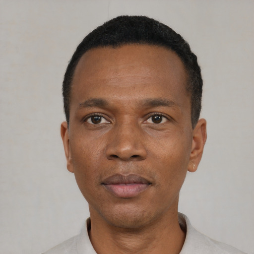 Neutral black adult male with short  black hair and brown eyes