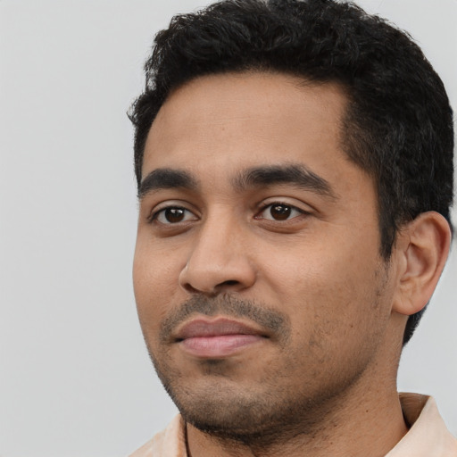 Neutral latino young-adult male with short  black hair and brown eyes
