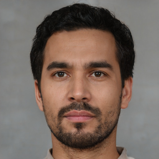 Neutral latino young-adult male with short  black hair and brown eyes