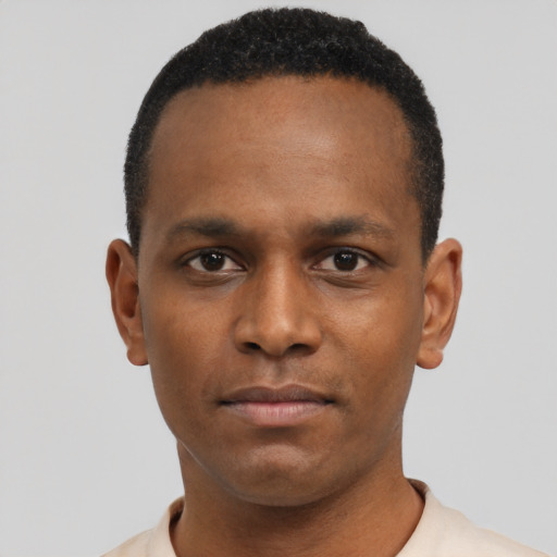 Neutral black young-adult male with short  black hair and brown eyes