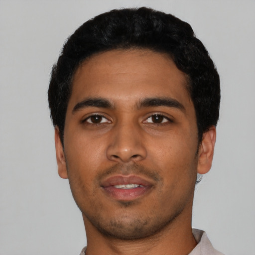 Neutral latino young-adult male with short  black hair and brown eyes