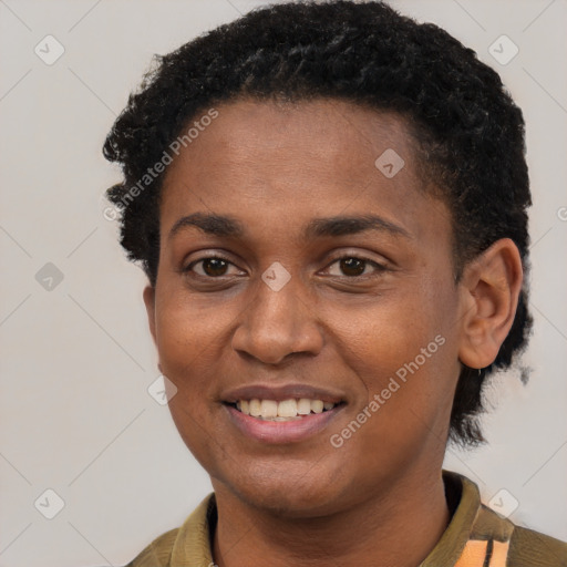 Joyful black young-adult female with short  brown hair and brown eyes