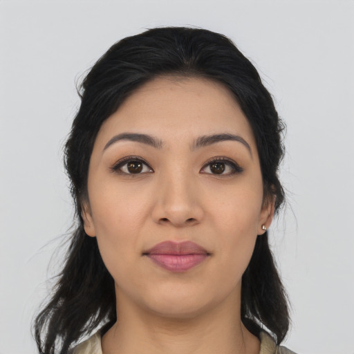 Joyful latino young-adult female with medium  black hair and brown eyes