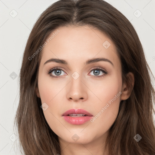 Neutral white young-adult female with long  brown hair and brown eyes