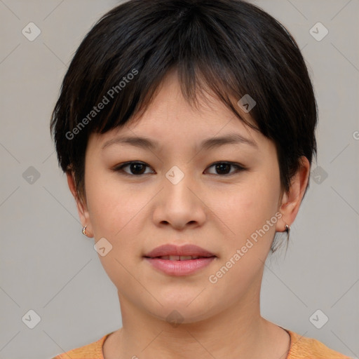 Joyful asian young-adult female with short  brown hair and brown eyes