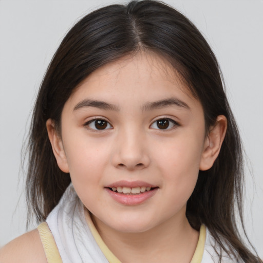 Joyful white child female with medium  brown hair and brown eyes
