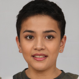 Joyful asian young-adult female with short  brown hair and brown eyes