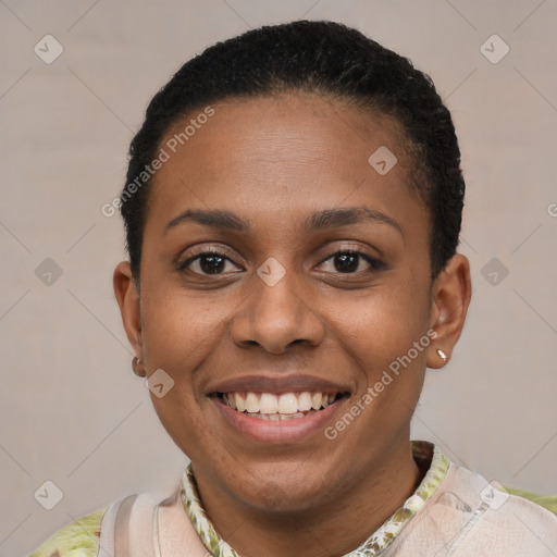 Joyful black young-adult female with short  brown hair and brown eyes