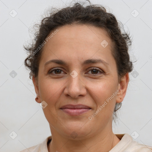 Joyful white adult female with short  brown hair and brown eyes