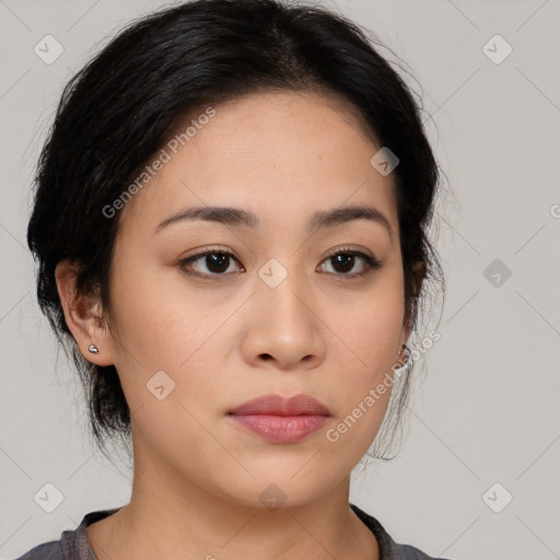 Joyful latino young-adult female with medium  black hair and brown eyes