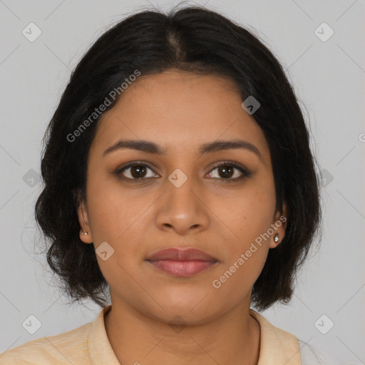 Joyful latino young-adult female with long  brown hair and brown eyes