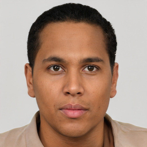 Neutral latino young-adult male with short  brown hair and brown eyes