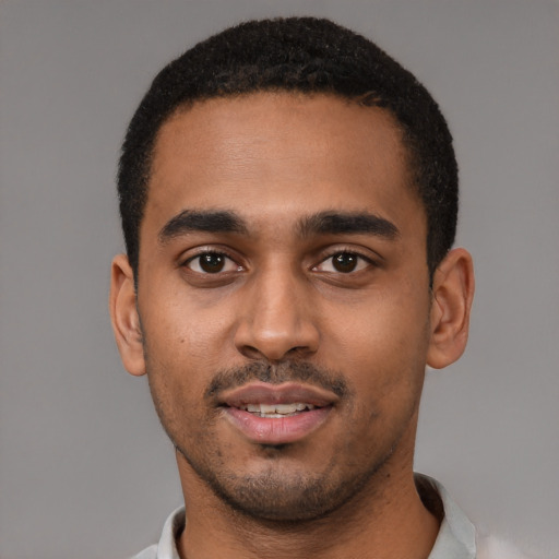 Neutral black young-adult male with short  black hair and brown eyes