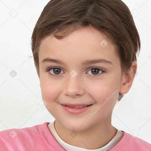 Joyful white child female with short  brown hair and brown eyes