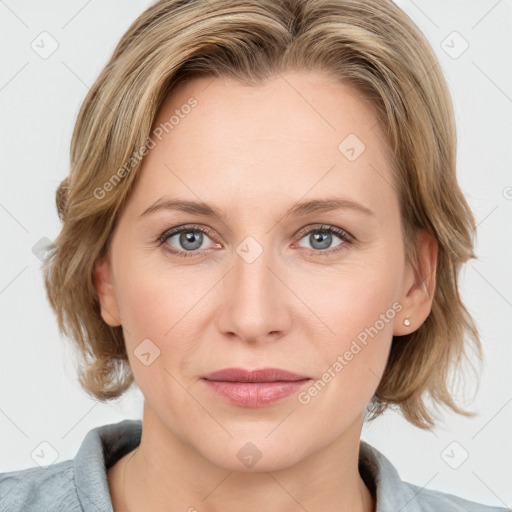 Joyful white young-adult female with medium  brown hair and blue eyes