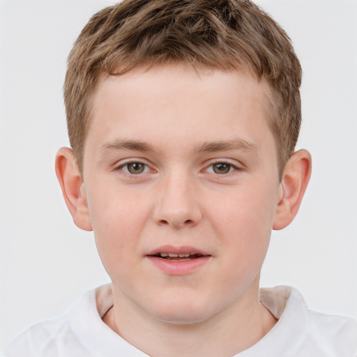 Joyful white child male with short  brown hair and grey eyes