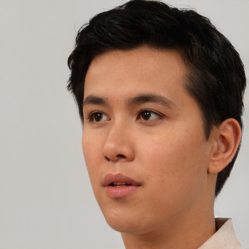 Neutral asian young-adult male with short  black hair and brown eyes