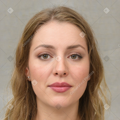 Joyful white young-adult female with long  brown hair and green eyes