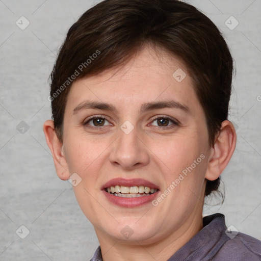 Joyful white adult female with short  brown hair and grey eyes