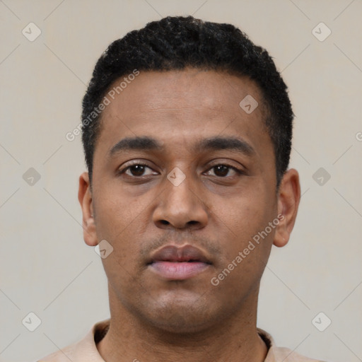 Neutral latino young-adult male with short  black hair and brown eyes