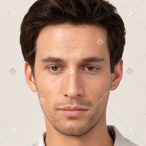 Neutral white young-adult male with short  brown hair and brown eyes