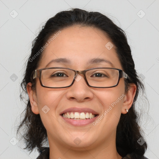 Joyful white adult female with medium  brown hair and brown eyes