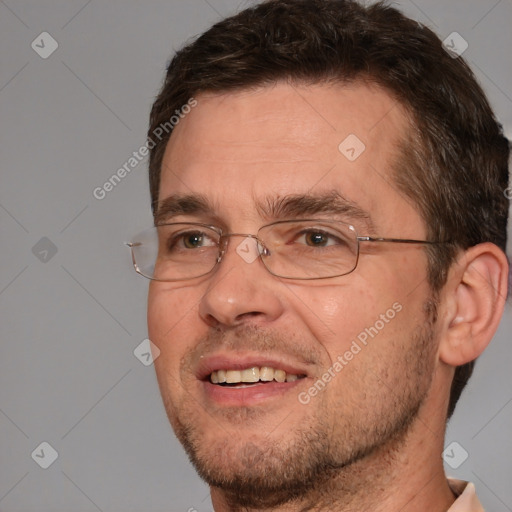 Joyful white adult male with short  brown hair and brown eyes