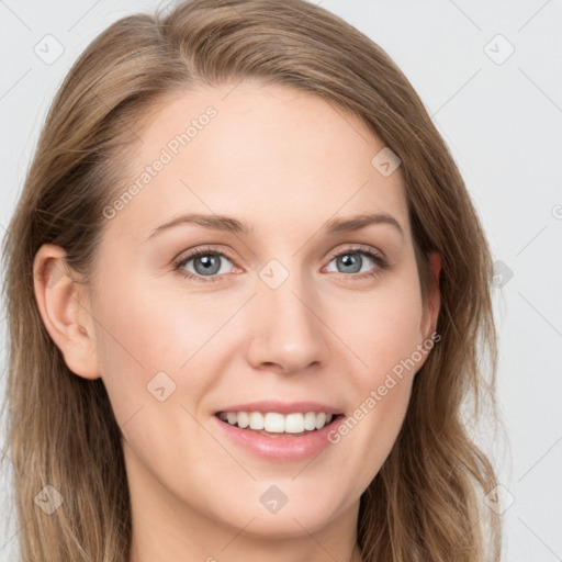 Joyful white young-adult female with long  brown hair and blue eyes