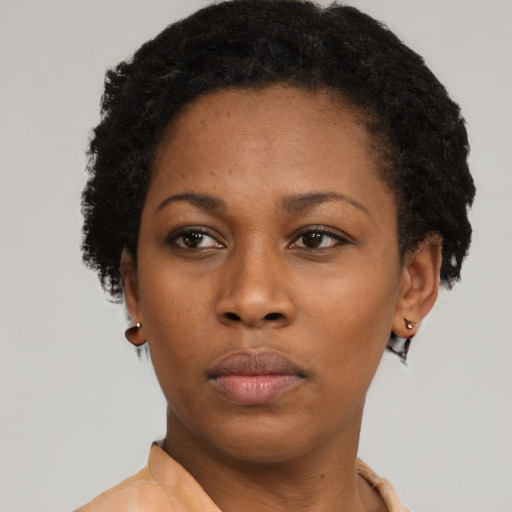 Neutral black adult female with short  brown hair and brown eyes