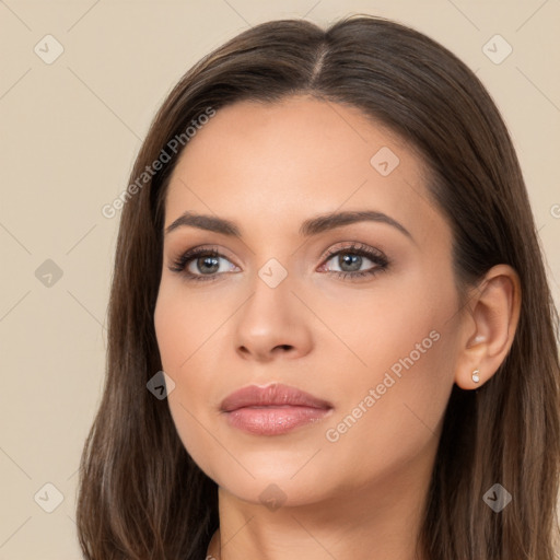 Neutral white young-adult female with long  brown hair and brown eyes