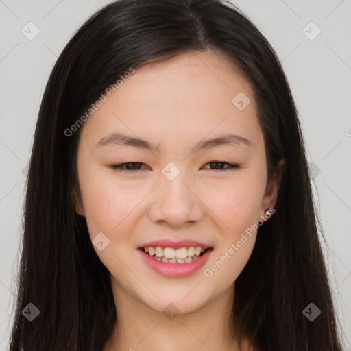 Joyful asian young-adult female with long  brown hair and brown eyes