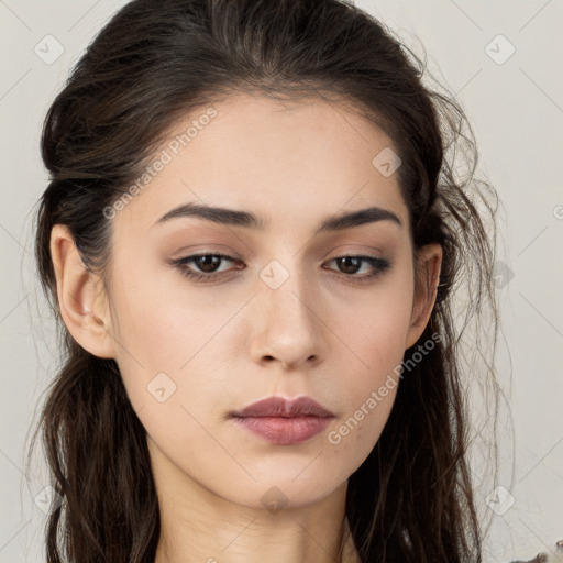 Neutral white young-adult female with long  brown hair and brown eyes