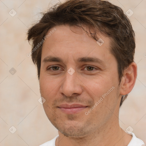 Joyful white adult male with short  brown hair and brown eyes