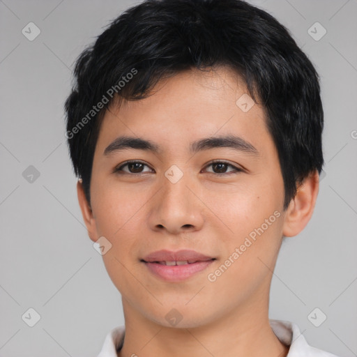 Joyful asian young-adult male with short  black hair and brown eyes