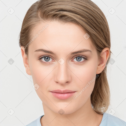 Joyful white young-adult female with medium  brown hair and blue eyes