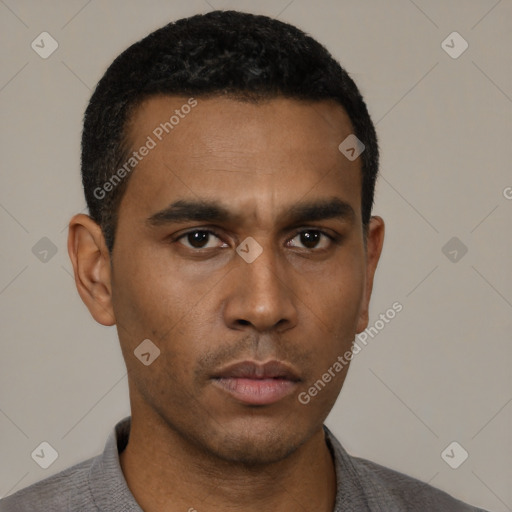 Neutral latino young-adult male with short  black hair and brown eyes