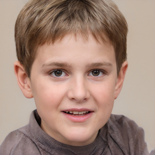 Joyful white child male with short  brown hair and grey eyes