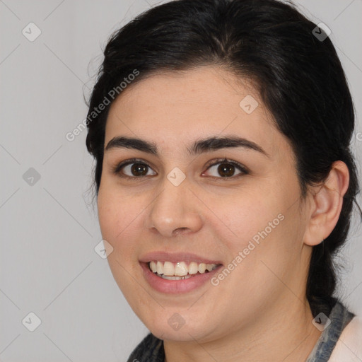 Joyful white young-adult female with medium  brown hair and brown eyes