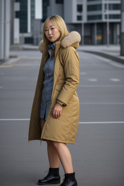 Mongolian 45 years female with  blonde hair