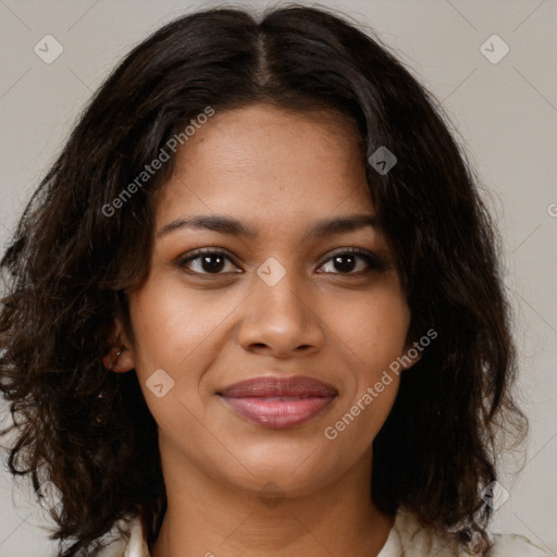 Joyful black young-adult female with medium  brown hair and brown eyes